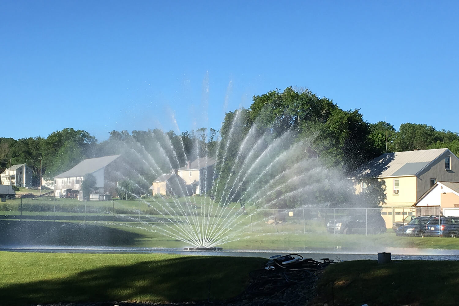 One of Otterbine's Aries Aerating Fountains in a residential area