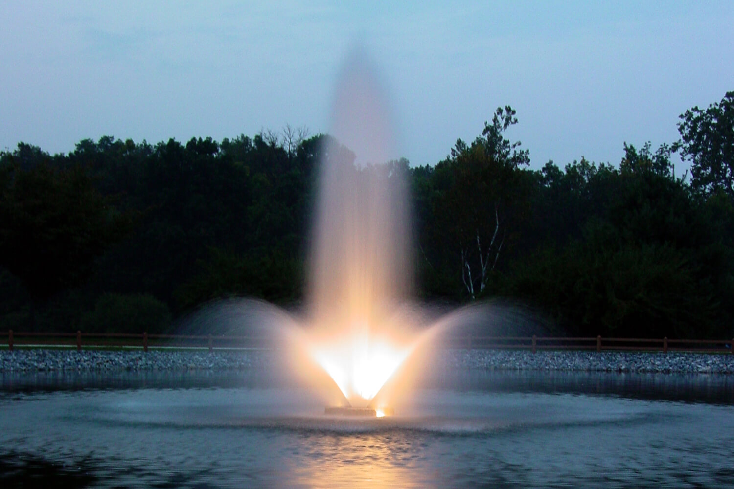 One of Otterbine's Aerating Fountains with Fountain Glo™ LED Low Voltage Lighting